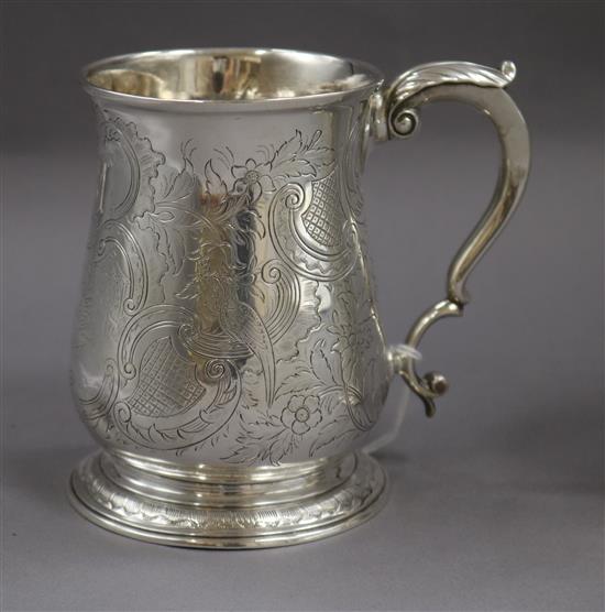 A George II engraved silver baluster mug, London 1752, 10 oz.